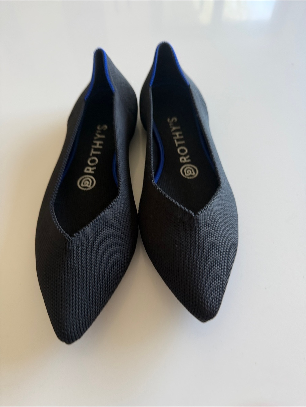 Rothy's Black Pointed Knit Flats with Blue Trim